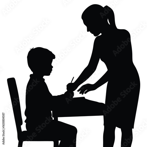 Teacher guiding student at desk learning education