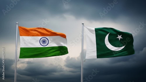 Indian And Pakistan Flags Waving Against Dramatic Cloudy Sky Indicating Political Relations