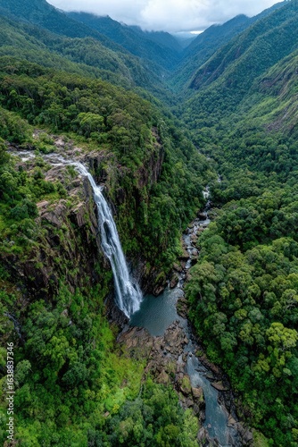 Waterfall Through Lush Green Valley