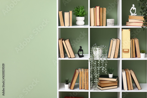 Modern white bookshelf with...