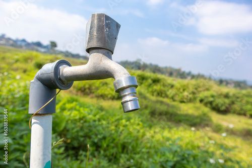 Εκτύπωση καμβά Water supply, outdoor garden faucet, dry faucet. selective focus