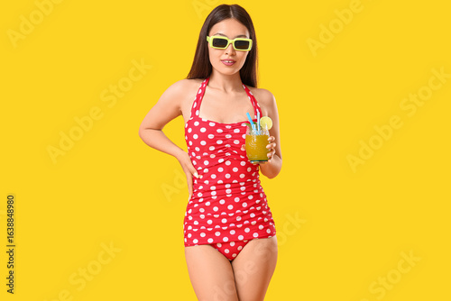 Young woman in red polka do...