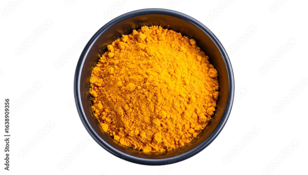 Turmeric powder in bowl. Turmeric powder in bowl.