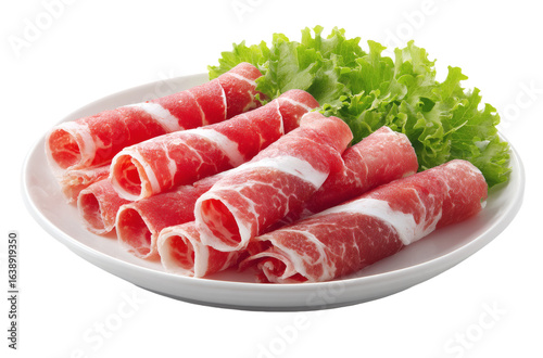 Freshly sliced beef rolls served on a white plate with fresh green lettuce, ideal for hot pot or barbecue.