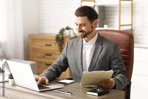 Businessman working with co...