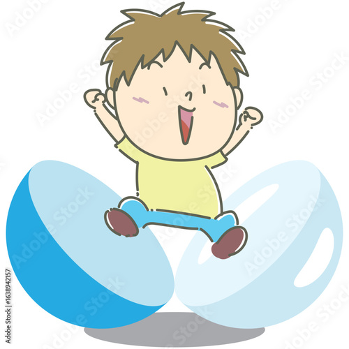 青のカプセルから勢いよく飛び出す男の子