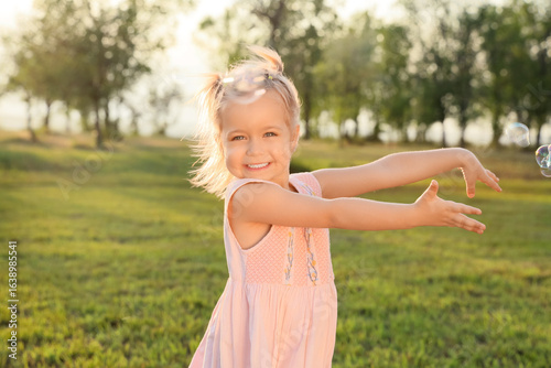 Cute little girl with soap ...
