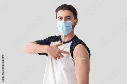 Young man in medical mask p...