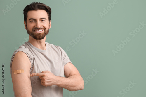 Young man pointing at appli...