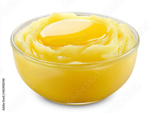 Golden clarified butter in a glass bowl