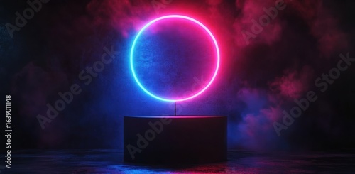 glowing neon circle with blue and pink light on black pedestal surrounded by dark smoky background creating futuristic atmosphere