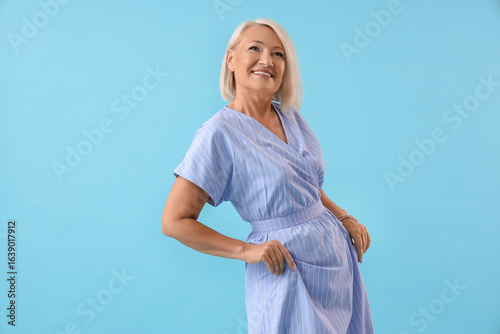 Happy mature woman dancing ...