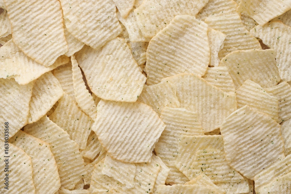 Fototapeta premium Homemade Flavored Paprika Potato Chips in a Bowl, top view. Flat lay