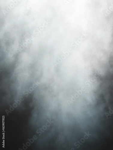 Dense mist or fog with varying shades of gray and white creating a mysterious and ethereal atmosphere
