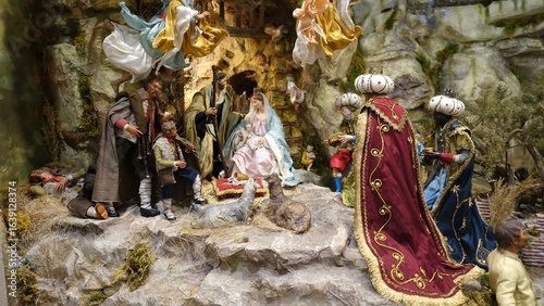 Scene of the birth of Jesus made with small figurines, from a traditional neapolitan nativity scene.