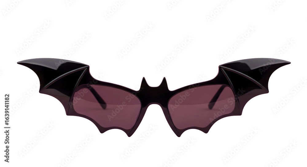 Fototapeta premium A pair of bat shaped sunglasses with dark frames and pink lenses on a black background are displayed