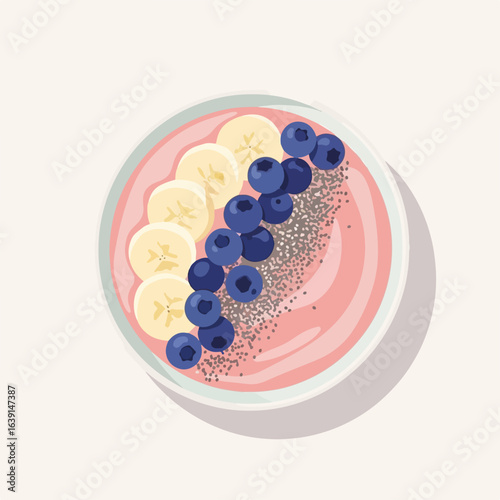 Vibrant smoothie bowl with banana slices and blueberries for wholesome eating. This smoothie bowl includes fresh fruit and chia seeds arranged attractively.