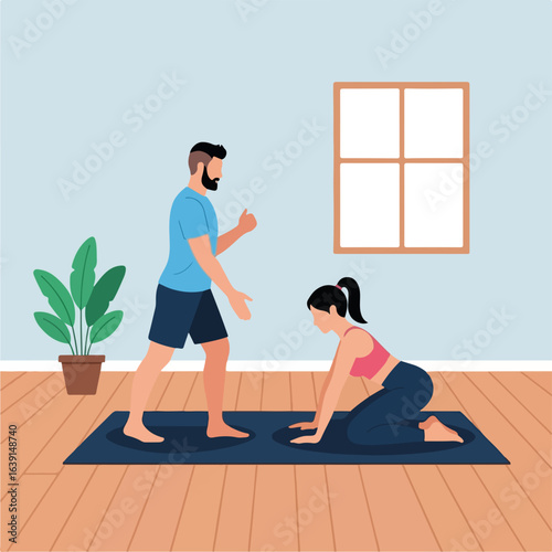 Fitness at home with a man guiding a woman in workout pose on a yoga mat. Fitness at home with a man in a light blue t-shirt helping with body posture and pose.