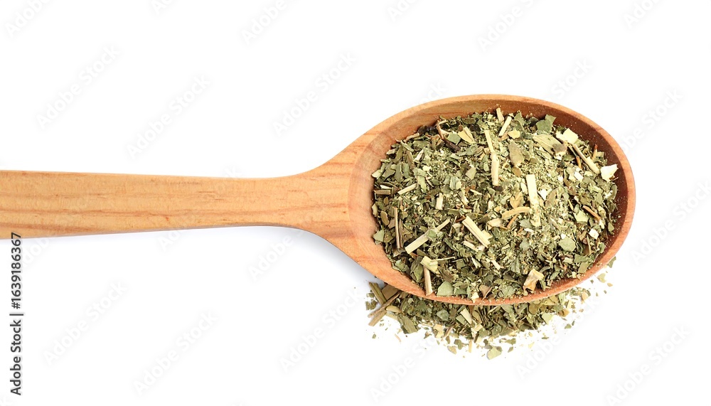 Dried herbs in a wooden spoon. Dried herbs in a wooden spoon.