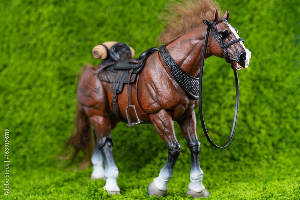 Fototapeta premium horses on green grass in studio