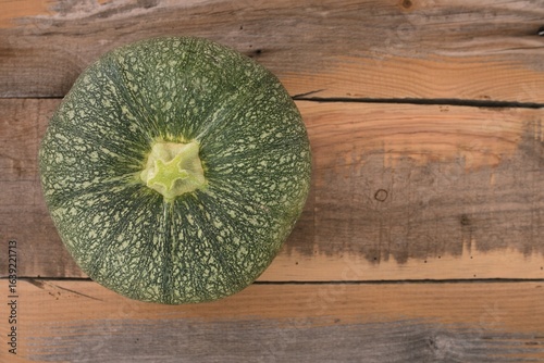 pumpkin on wooden table
