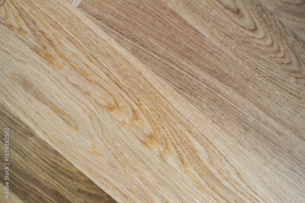 Naklejka premium Oak Herringbone Parquet - Natural Grain and Warm Contrast