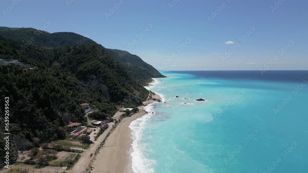 Aerial view of Agios Nikitas village with beautiful beach, Ionian Sea, Greece. Aerial view of Agios Nikitas village with beautiful beach, Ionian Sea, Greece.