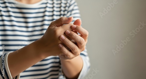 Closeup of hands clasped together