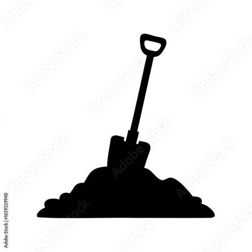 Black silhouette image of a shovel digging into a pile of dirt
