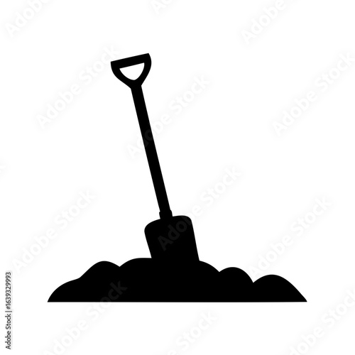 Black silhouette of a shovel digging into a pile of dirt