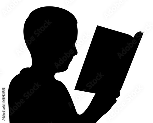 Silhouette of a child engrossed in reading a book with focus
