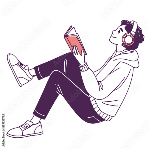 Person wearing headphones reading a book while relaxing with legs crossed