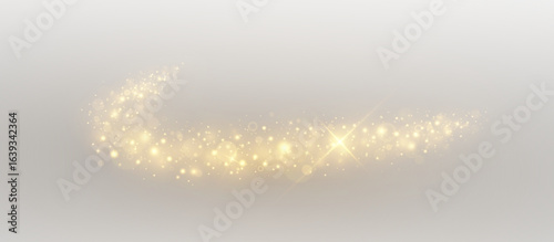 Shining particle trail with sparkling dust and glistering flow of silver and gold. Elegant decoration bursts in a glowing, luxurious spray.