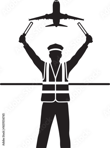 Silhouette of an airport ground marshal guiding an airplane with wands.