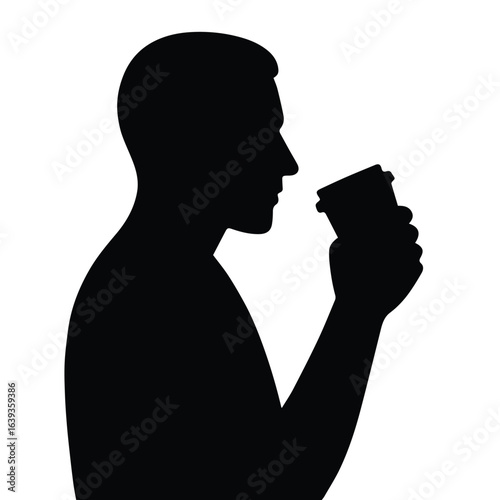Silhouette of a man in profile holding and smelling a small object isolated on white background