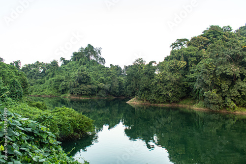 Stunning view of Kaptai Lake with green hills.