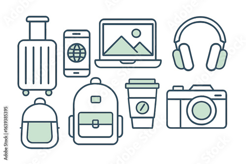Essential travel items for a modern adventure including a suitcase, laptop, and camera