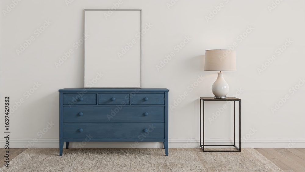 Fototapeta premium Chic interior design of a lounge area with a blue chest of drawers, empty poster mockup, side table, lighting fixture, and beige carpet. Artistic home styling.