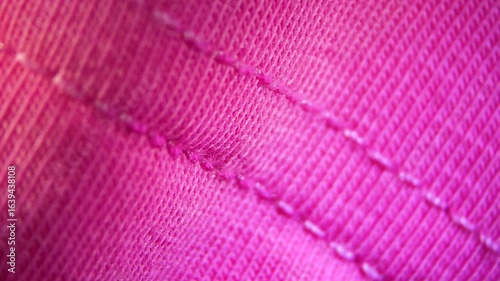 Pink cotton textile material cloth texture blur background macro