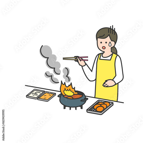 女性がキッチンで揚げ物をしていたら油に引火したシーン