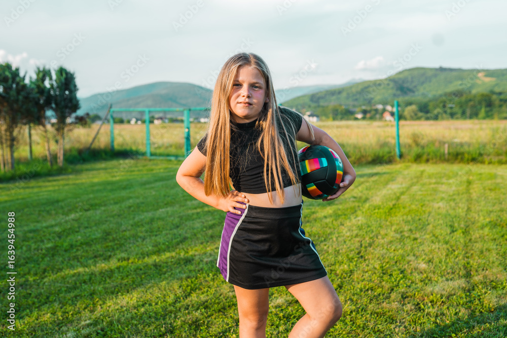 School girl plays volleyball. Summer sports for children,. School girl plays volleyball. Summer sports for children,.
