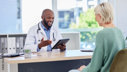 Doctor explaining diagnosis to patient using tablet