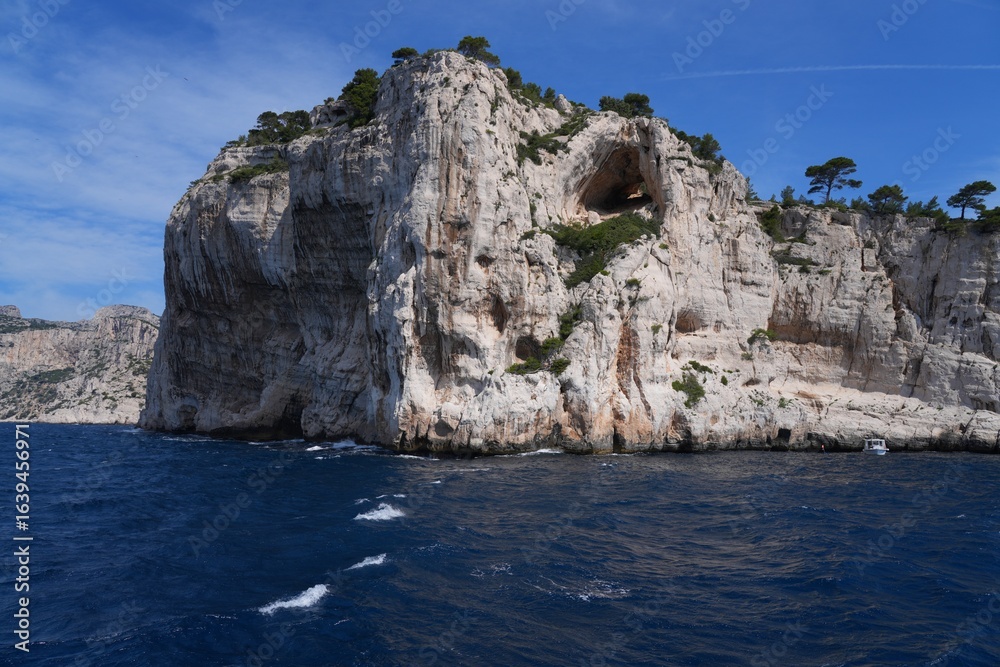 View of the Calanques de Cassis, a national park of limestone cliffs over the Mediterranean Sea near Marseilles, France View of the Calanques de Cassis, a national park of limestone cliffs over the Mediterranean Sea near Marseilles, France