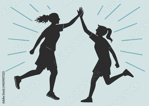 Silhouette of two female athletes giving each other a high five to celebrate their success, symbolizing teamwork, achievement, and the joy of sports and fitness