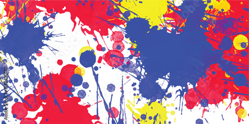 Abstract colorful splatter paint background with red yellow and blue splashes on a white backdrop perfect for modern design concepts