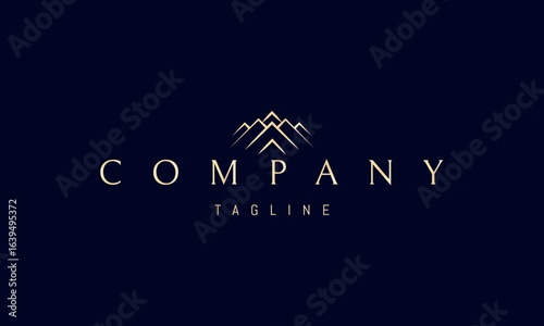 A golden vector logo featuring an abstract image peaks of majestic mountains symbolizing strength, adventure, and natural beauty.