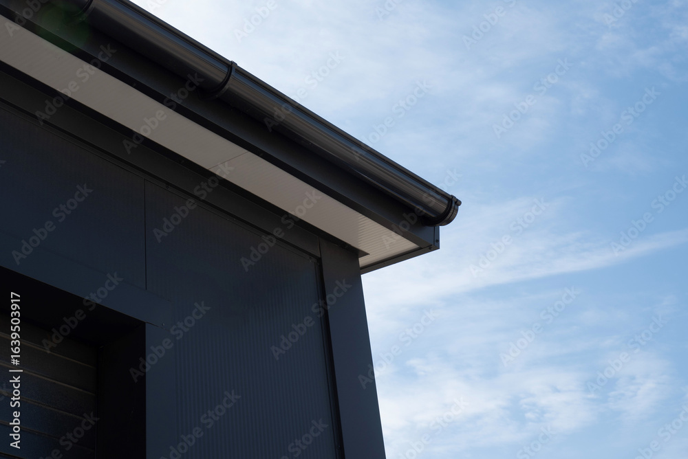Ταπετσαρία PVC rain gutter at eaves with soffit and fascia