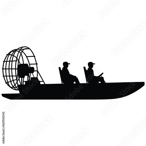 Silhouette of an airboat with two people aboard
