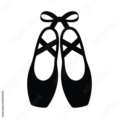 Classic black ballet slippers tied with a bow