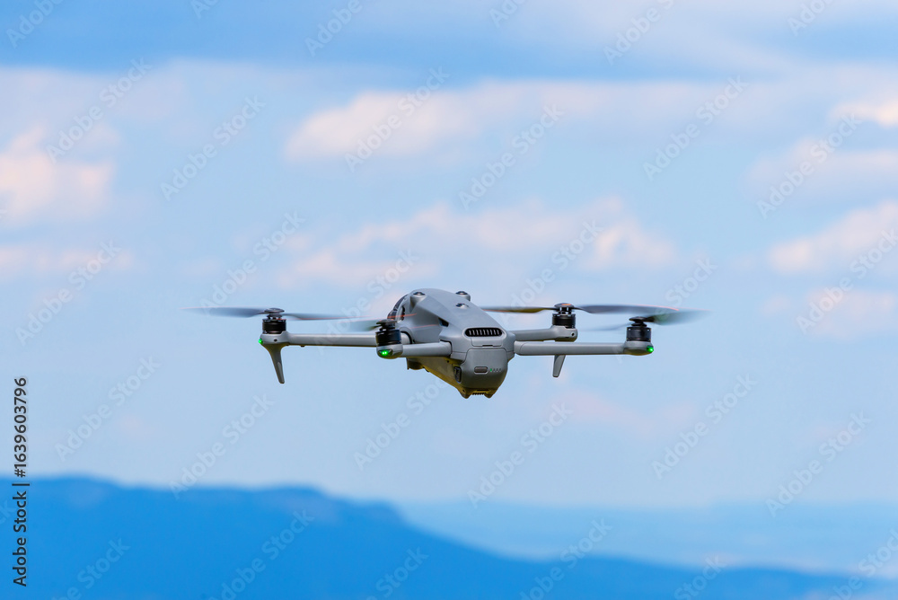 custom made wallpaper toronto digitalDrone flying over mountains under blue sky with clouds
